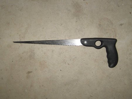 A plastic-handled saw